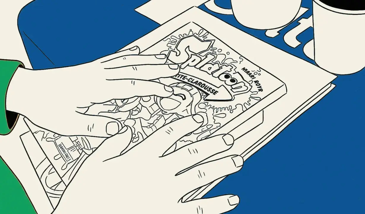 A book in the hands of a young reader