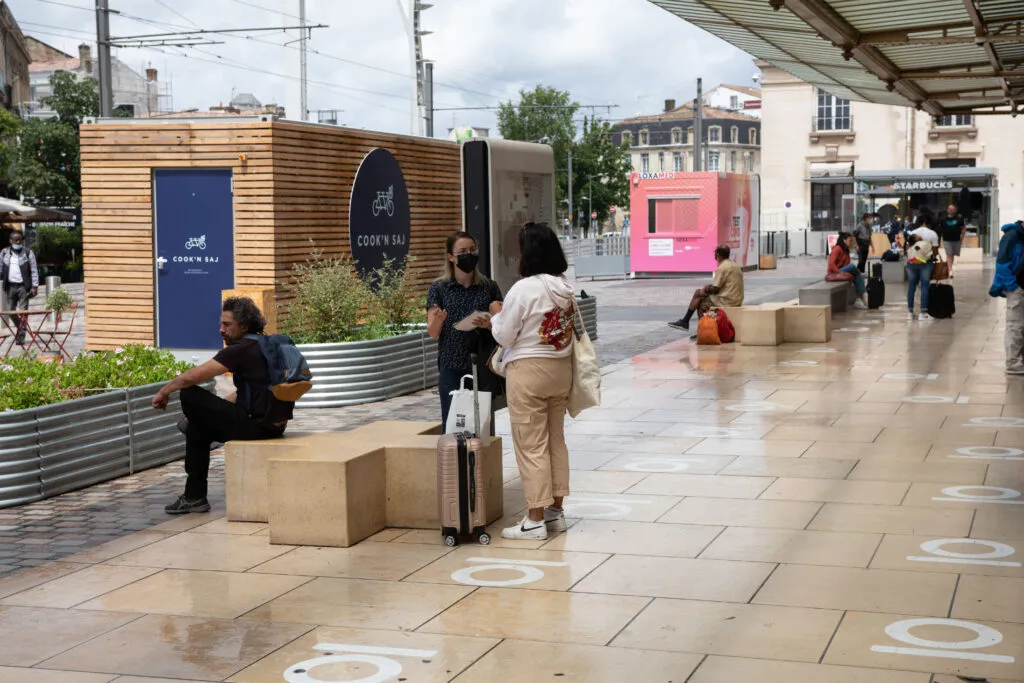 A team member running an interview in the street