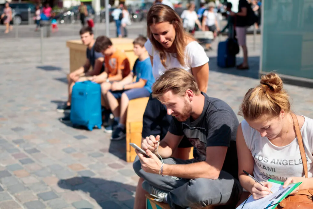 Example of a user test on a mobile app with a moderator and a person taking notes