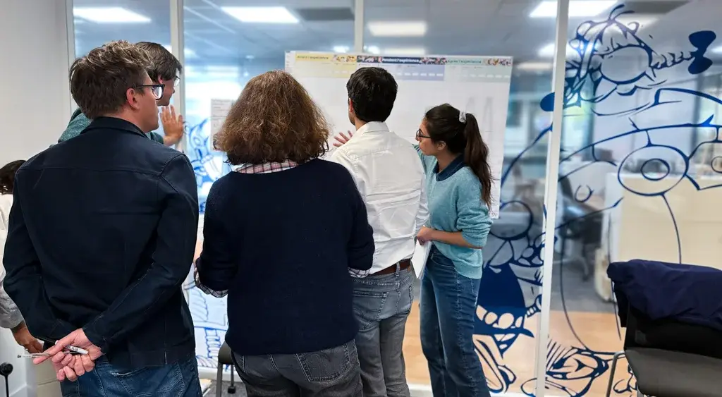 Team workshop with several people in collaborative discussion