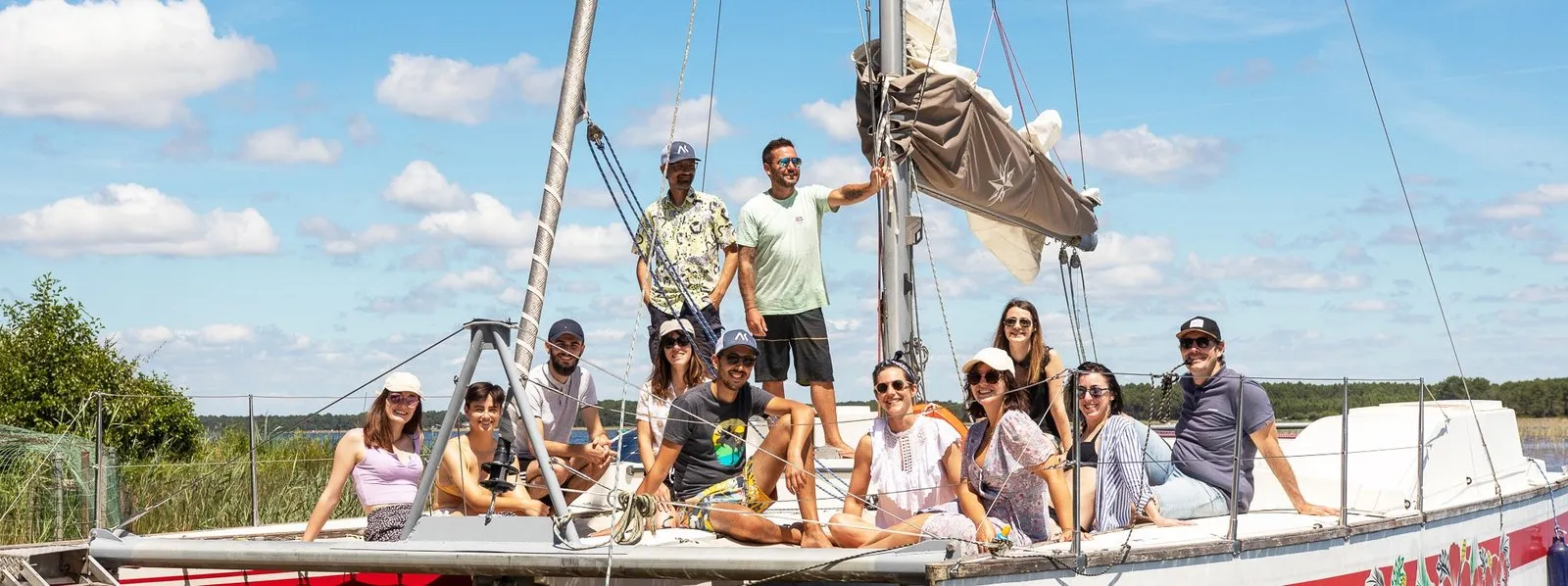 The Akiani team on a sailing boat