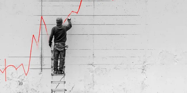 Un street artist dessine un graphe sur un mur