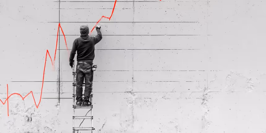 Un street artist dessine un graphe sur un mur