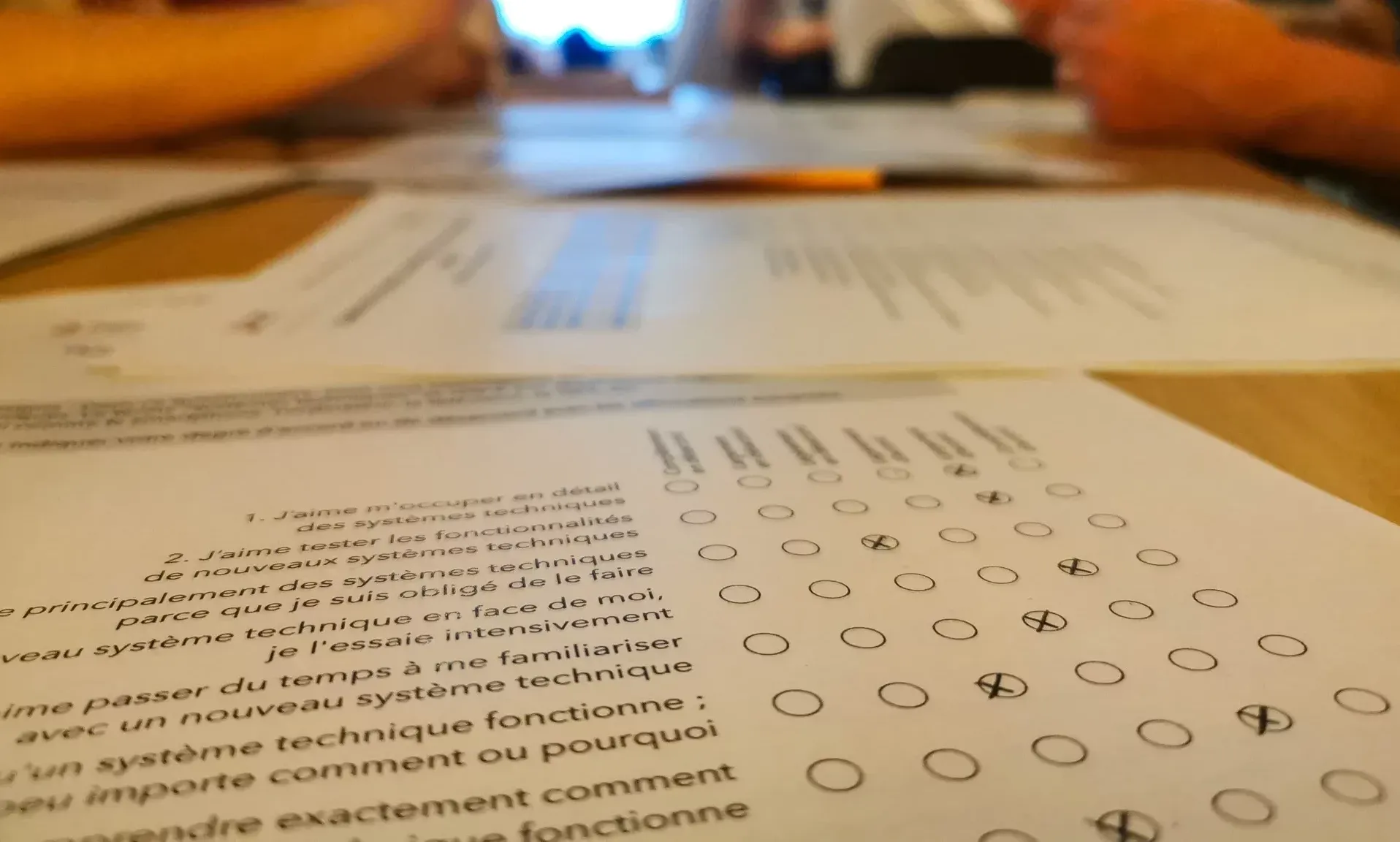 UX questionnaires workshop, participants filling in forms