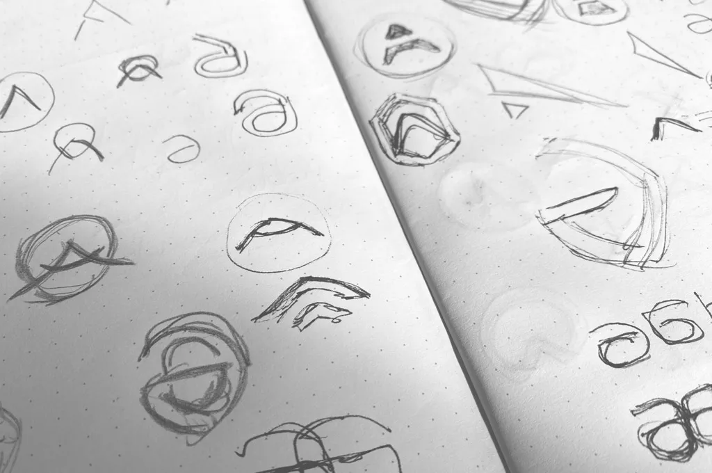 Visual identity sketches on paper